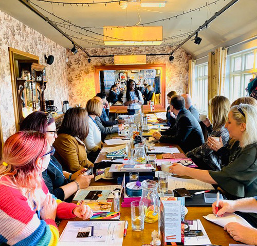 people at a pop connect mixed networking meeting